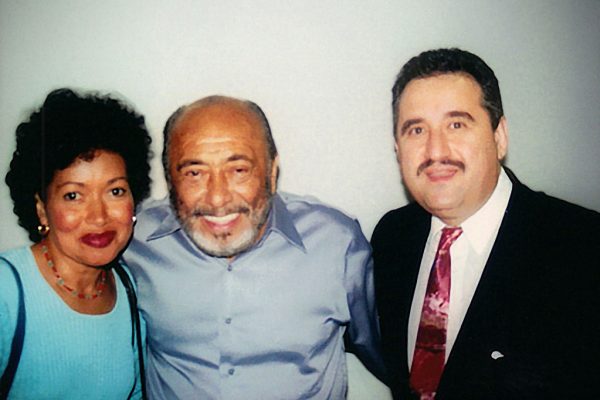 left to right: WBAI radio host: Nancy Rodriguez, Multi Grammy Award winner, Latin music icon, master pianist, Eddie Palmieri, Demetrios Kastaris. Flushing Town Hall, September 21, 2001, photo credit: Hilda Kastaris