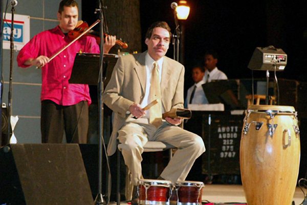 Alí Bello on violin, Dave Valentin on bongo bell, June 16, 2003, Seuffert Bandshell, Woodhaven Queens, New York (photo credit Jerry Lacay)