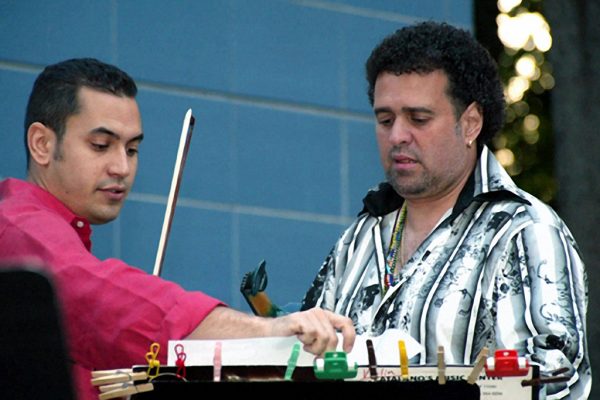 Violinists Alí Bello & Alfredo de la Fé , "Homenaje a Mongo Santamaria" (Homage to Mongo Santamaria) Concert, June 16, 2003, Seuffert Bandshell, Woodhaven Queens, New York (photo credit Jerry Lacay)