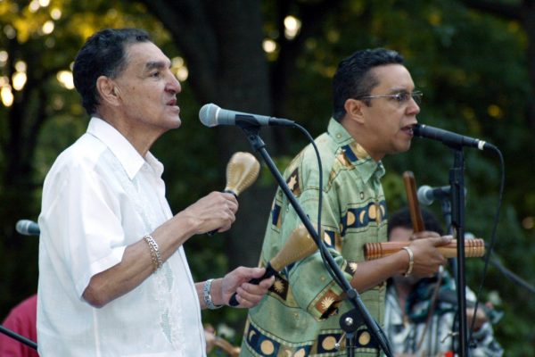Lead singers: Hiram Remón and Herman Olivera (El Sonero del Siglo), Homenaje a Mongo Santamaría Concert, June 16, 2003, Seuffert Bandshell, Woodhaven Queens, New York (photo credit Jerry Lacay)