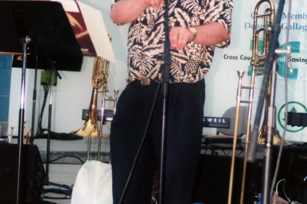 Demetrios making announcements, June 16, 2003, Homenaje a Mongo Santamaría Concert, Seuffert Bandshell, Woodhaven Queens, New York, Photo credit: Jerry Lacay.