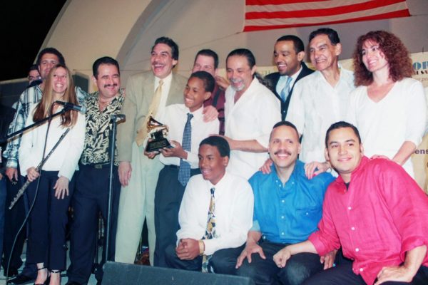 After the show, John Walsh, Alfredo de la Fé, Connie Grossman, Demetrios Kastaris, Dave Valentin, Wayne Goodman, Anthony Almonte Leon, Frank Almonte Leon, Angel Rodriguez, Wesley Reynoso, Solo Rodriguez, Hiram Remón, Alí Bello, Andrea Brachfeld, June 16, 2003, Homenaje a Mongo Santamaría Concert, Seuffert Bandshell, Woodhaven Queens, New York, Photo credit: Jerry Lacay.