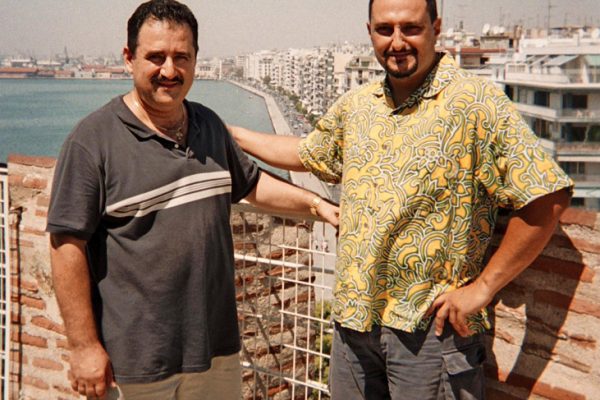 left: Demetrios, right, Yannis Economides, leader of Aroma Caribe, on top of the Lefko Pyrgo (White Tower) in Thessaloniki, Greece, August, 2004