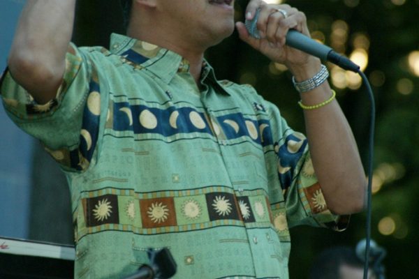 The gifted vocalist Herman Olivera (El Sonero del Siglo), June 16, 2003, Homenaje a Mongo Santamaría Concert, Seuffert Bandshell, Woodhaven Queens, New York, Photo credit: Jerry Lacay.