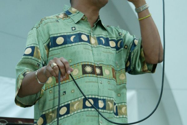 Herman Olivera (El Sonero del Siglo), June 16, 2003, Homenaje a Mongo Santamaría Concert, Seuffert Bandshell, Woodhaven Queens, New York, Photo credit: Jerry Lacay.