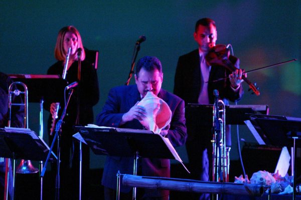 Connie Grossman, Demetrios Kastaris on a large conch shell, Alí Bello, Queens Theatre in the Park, Flushing New York, December 17, 2004, photo credit Jerry Lacay.
