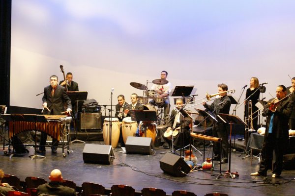 Christos Rafalides, Solo Rodriguez, Hiram Remón, Jerome Goldschmidt, Jotan Afanador, Chembo Corniel, Noah Bless, Connie Grossman, Steve Turre, Queens Theatre in the Park, Flushing New York, December 17, 2004, photo credit Jerry Lacay.