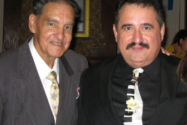 Left: singer Hiram Remon,, right Demetrios Kastaris, Concert: “Homenaje al Gran Maestro Cantante Colombiano Hiram Remon”, Stathakion Cultural Center, Astoria, Queens, NY, October 4, 2009